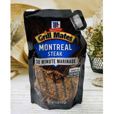 Маринад для мяса McCormick Grill Mates Montreal Steak оригинал можно перевести на русский язык следующим образом: Маринад для мяса McCormick Grill Mates Монреаль Стейк оригинал.